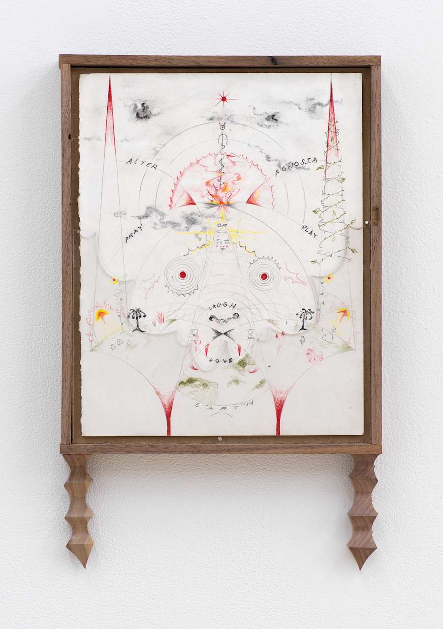 Image of Harry Gould Harvey IV drawing framed in foraged walnut wood, depicting circles of text and spires reaching upwards and downwards, in addition to piece of clear plexiglass in the shape of clouds in the corners of the frame, with pieces of carved walnut attached to the bottom of the frame.