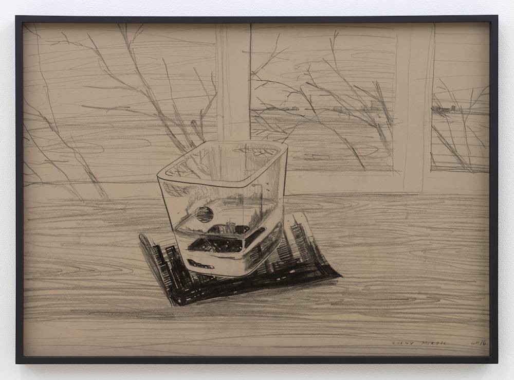 In a black frame, a pencil drawing depicting an abstract landscape resembling a dream world. The drawing in behind tinted glass.