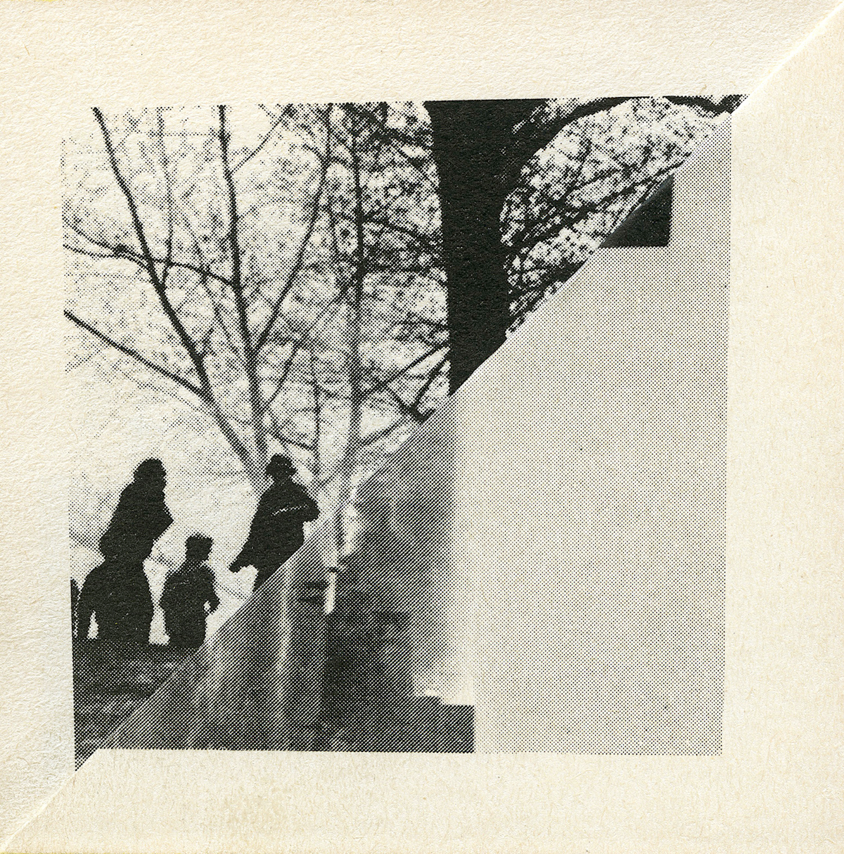 Image of the folded corner of the yellowed page of a book with a a central black and white square of imagery made of two triangles, which is the result of the folding of the page, the imagery on the top shows several figures under barren trees, and the bottom is more blurred and abstract, perhaps a smokey landscape.