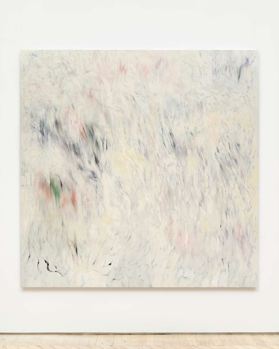 A large, square abstract painting primarily rendered in white with many gestural and colorful accents.