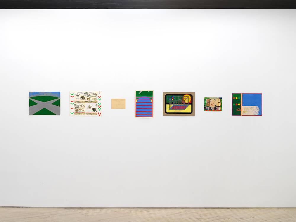 In a gallery space, a series of small works on paper are installed close together on a white wall. The drawing are clustered in a group. The drawings depict abstracted, cartoon-like character scenes. The sizes of the paper vary in length and proportion.