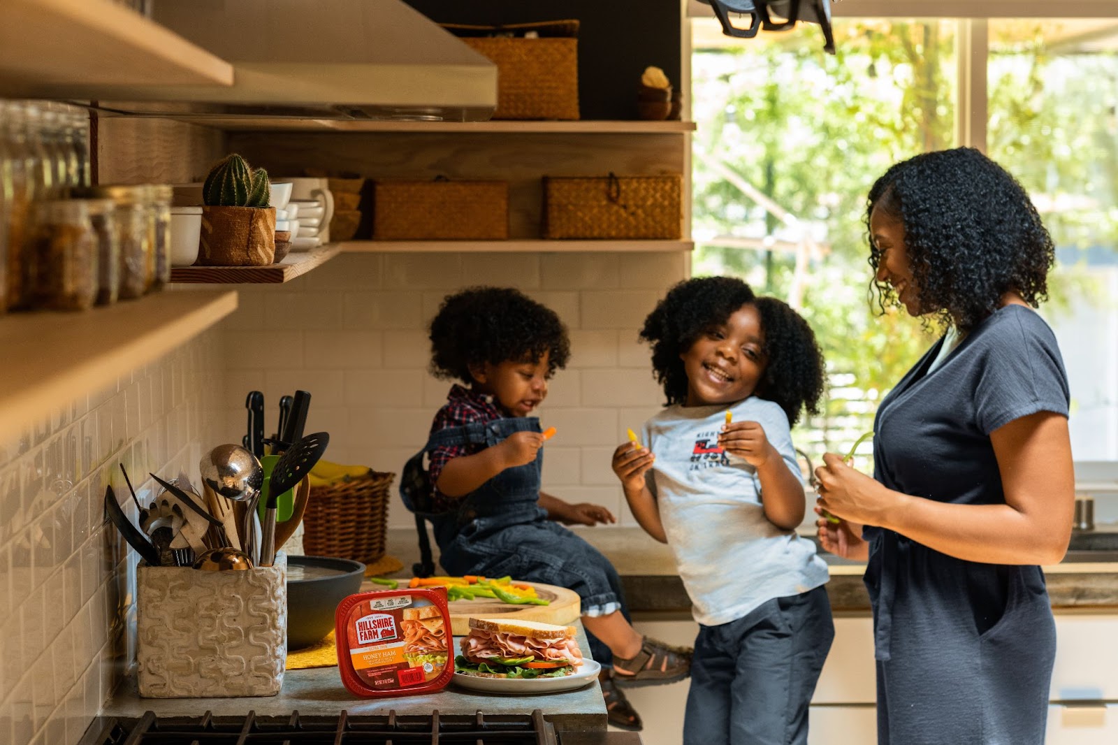 kitchen prep mother and kids prepping food in kitchen