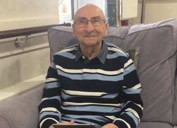 Don Greaves (89), a resident from the local community who visits Belong Macclesfield regularly and participates in activities.