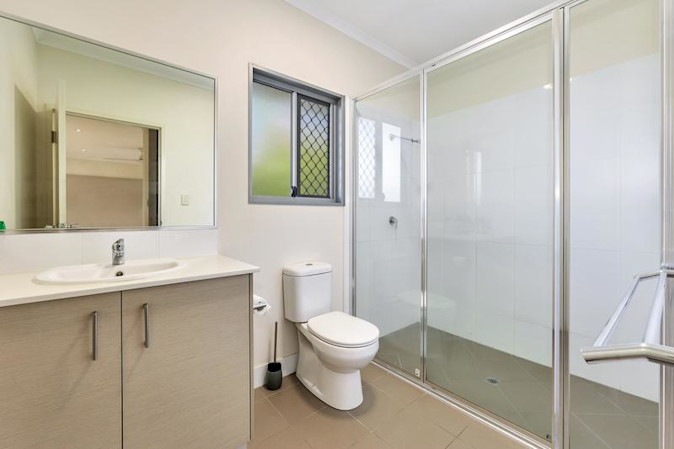 Bathroom with accessible shower.