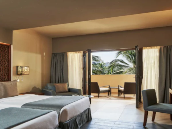 fanar-hotel-and-residences-hawana-salalah-oman-handicapped-bedroom-deluxe-room