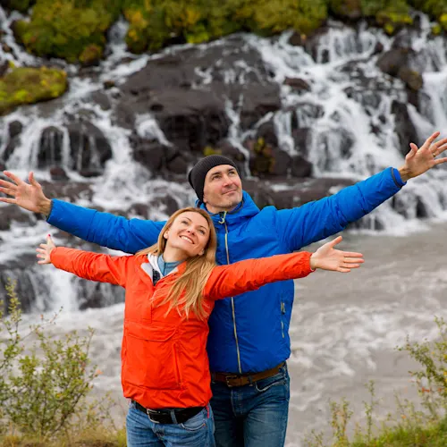 hraunfossar-waterfall-iceland-couple