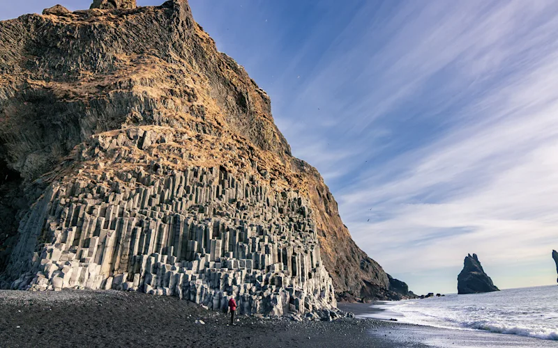 Marvel at Reynisfjara’s black sand beach