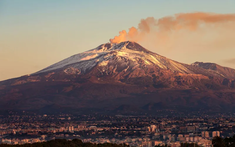 he-mount-Etna-Volcano-with-smoke-and-the-Catania-city-Sicily-island-Italy-Sicilia-Italia