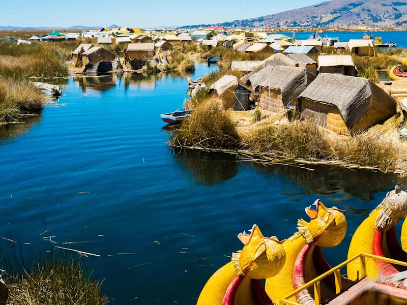 View-of-Uros-floating-islands-with-typical-boats-Puno-Peru