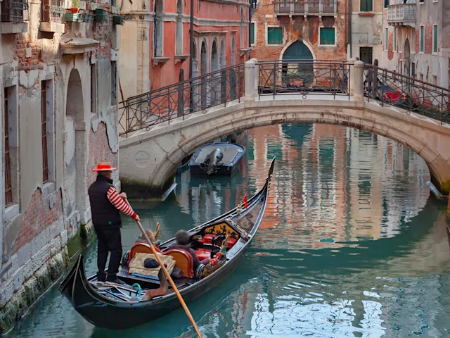 Venice-gondola-in-canal-swiper-hero-gallery
