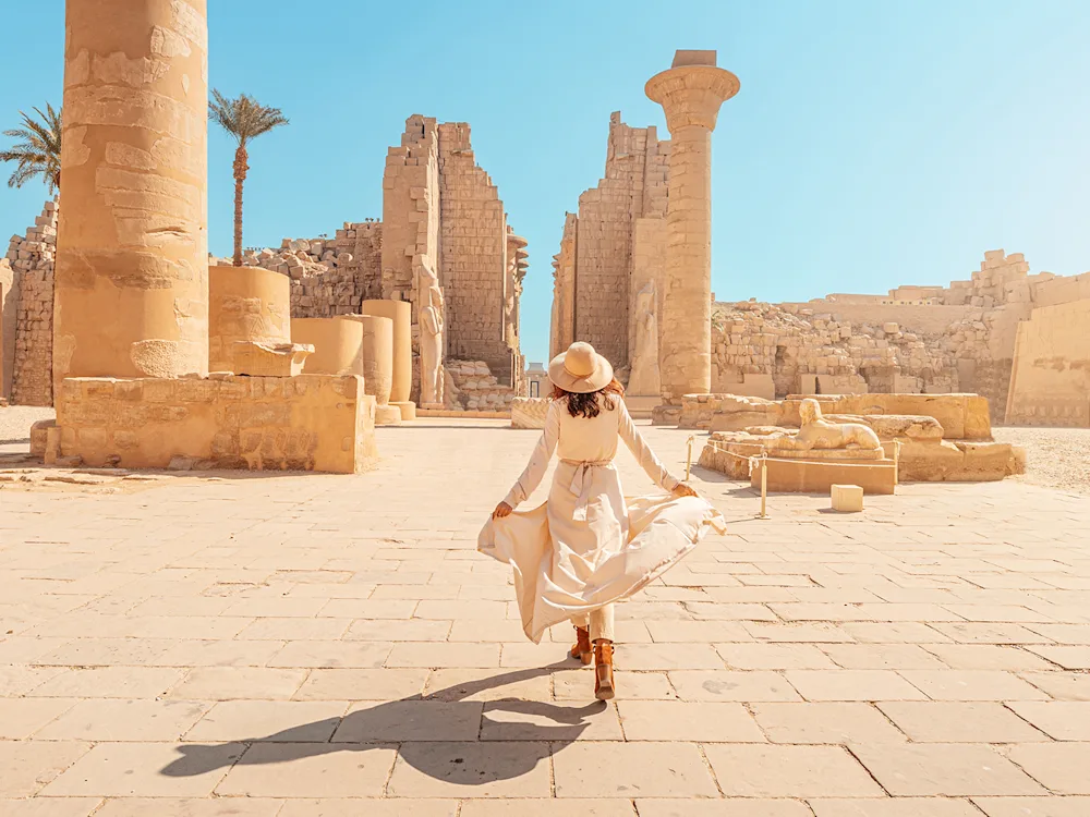 woman-exploring-karnak-temple-luxor-egypt-swiper-hero-gallery