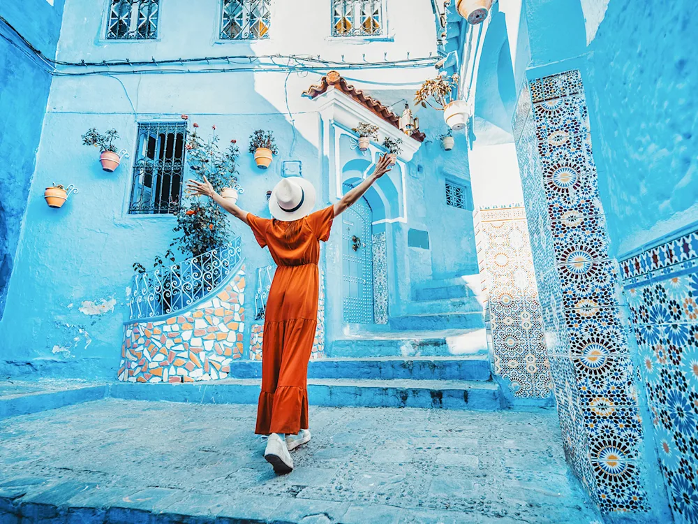 chefchaouen-morocco-blue-city-girl-swiper-hero-image