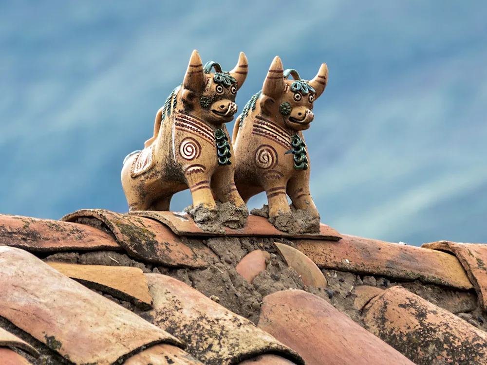ritual-figurines-bulls-raqchi-peru-swiper-hero-gallery
