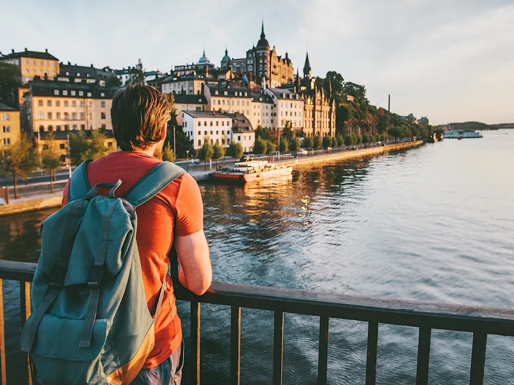 Stockholm-sweden-person-looking-city-swiper-hero-gallery