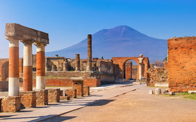 See Mount Vesuvius and explore the ruins of Pompeii
