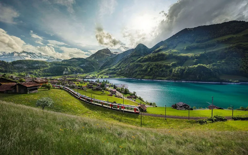 Embark on a scenic rail journey through the Swiss Alps