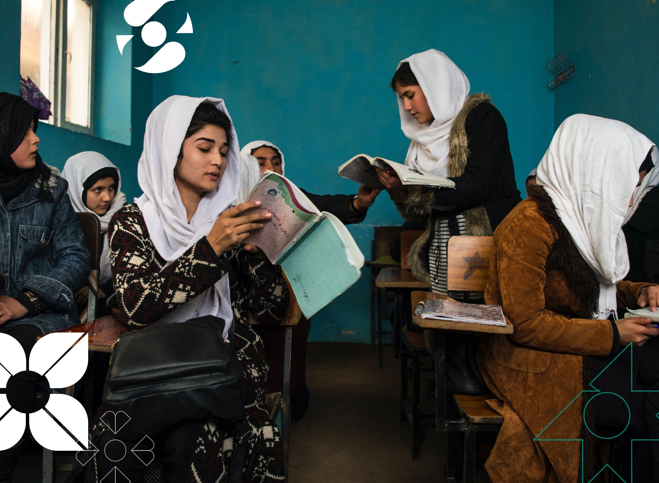 Female students reading in a classroom in Afghanistan