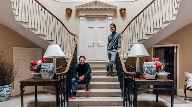 Plum host Tommaso photographed with his brother inside their Suffolk home