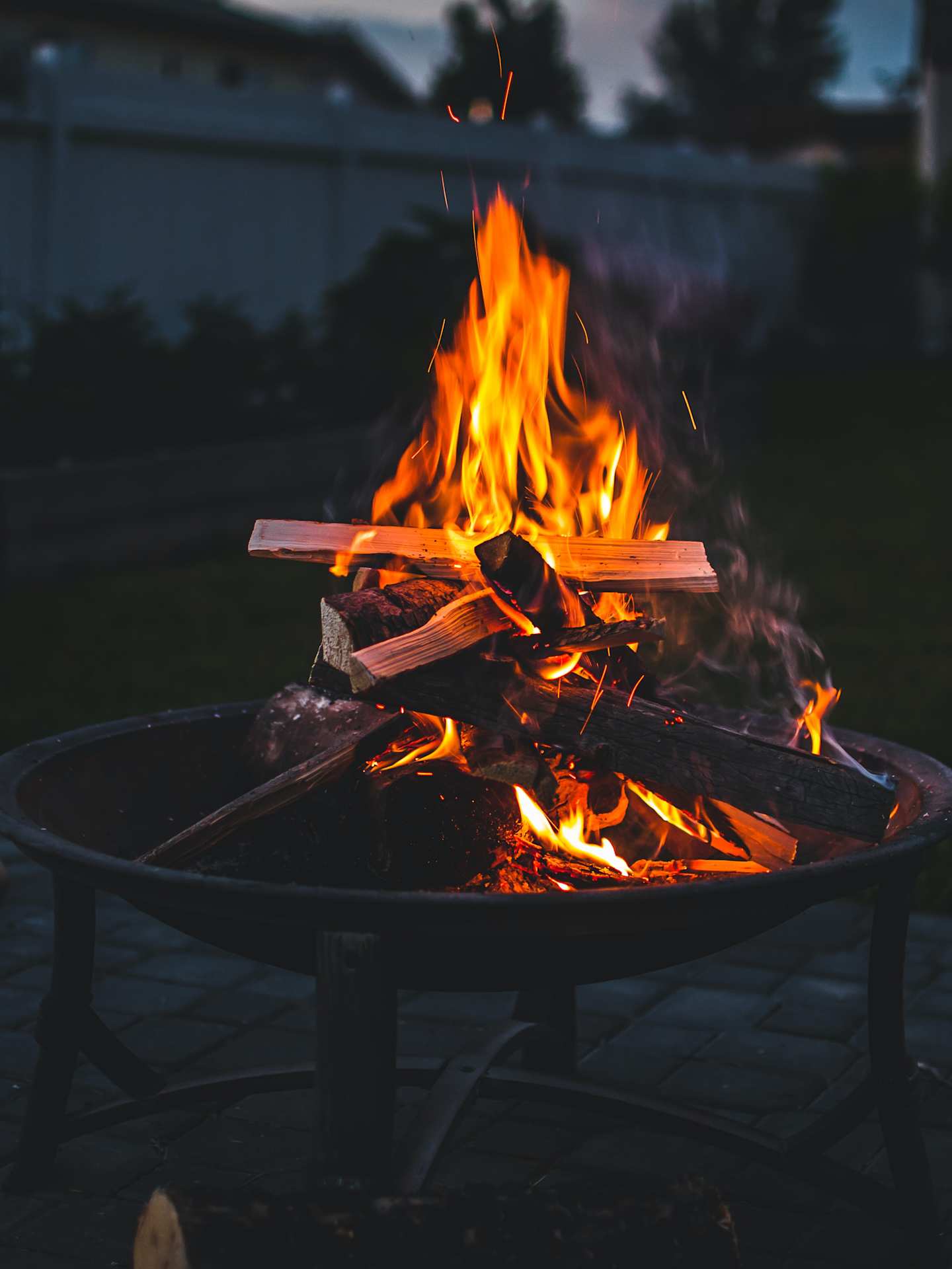 A view of burning wood in a fire pit