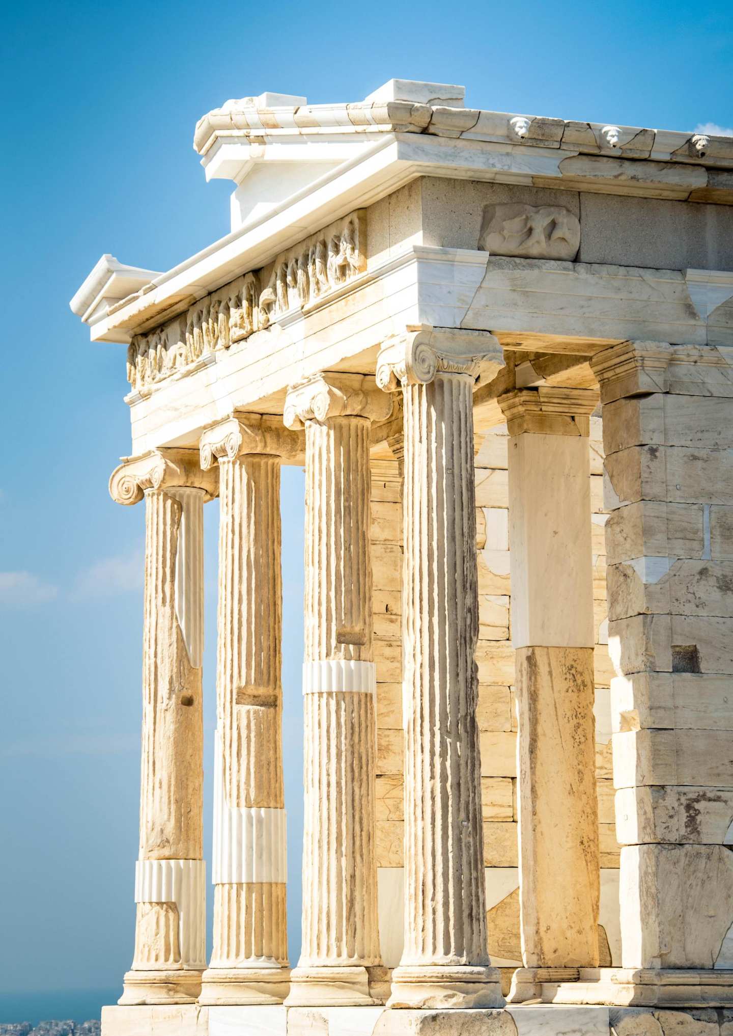 A side-on view of the beams at the front of the Parthenon at the Acropolis on a sunny day, Athens, Greece