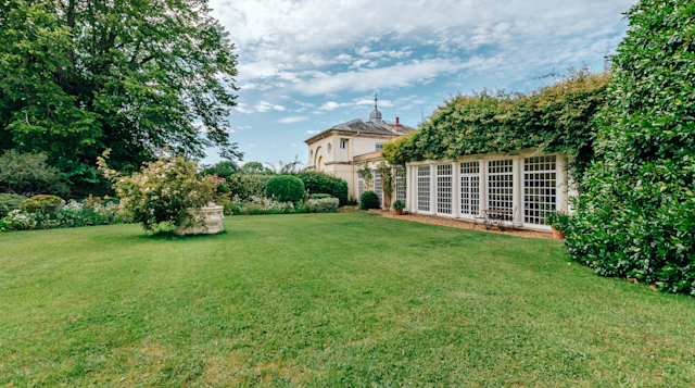 Pool and garden of Sense & Sensibility, Plum Guide home in Suffolk