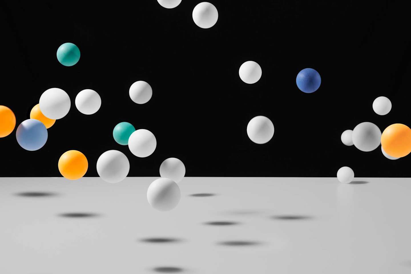 Art installation depicting ping pong balls falling