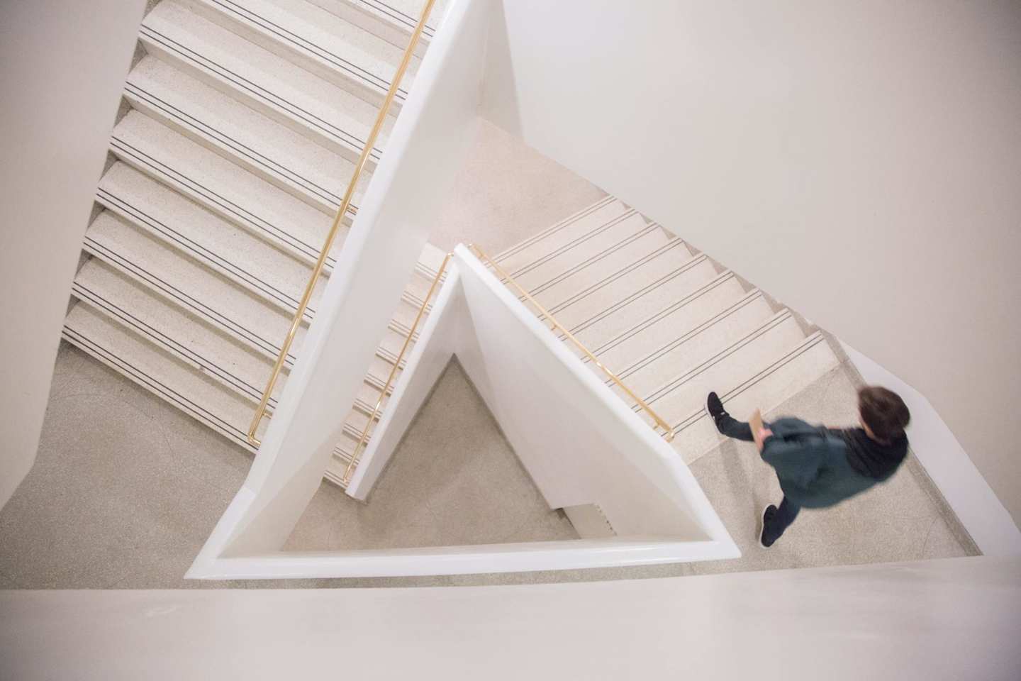 Person walking down the stairs at The Solomon R. Guggenheim Museum, New York