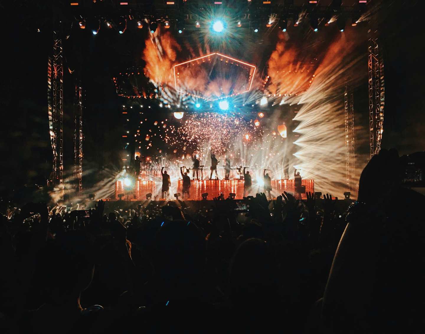 Group of people on stage during concert in Greek Theatre