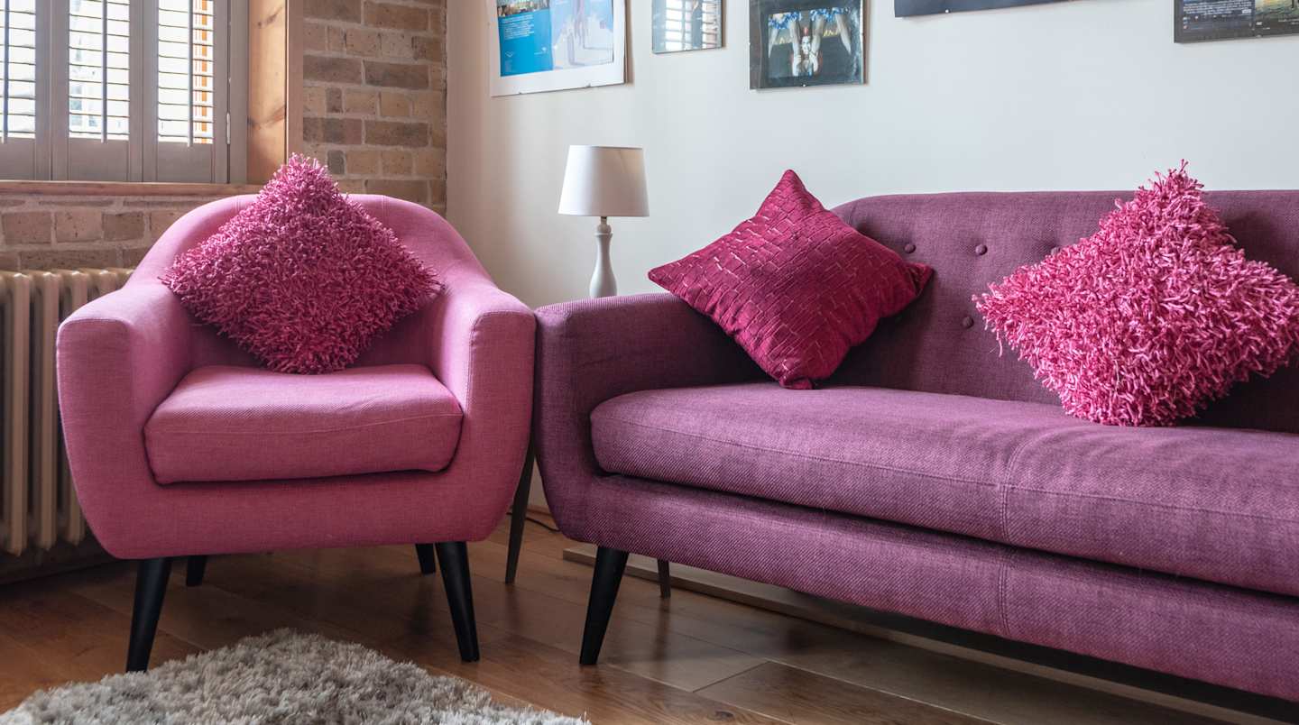 Sofa and chair in Jukebox, Plum Guide home in London