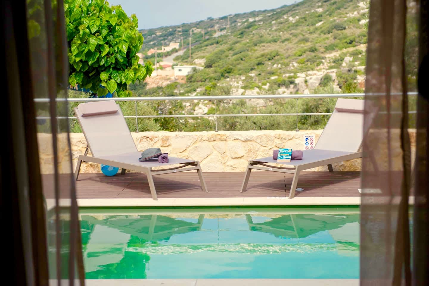 Swimming pool at the Marjoram & Sage, Plum Guide home in Crete, Greece