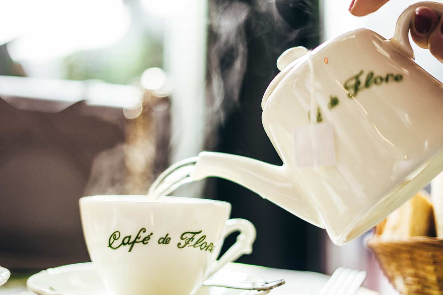 Tea pot and tea cup in Café de Flore, Paris