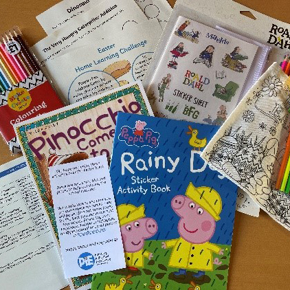 collection of stories, colouring pens and activities
