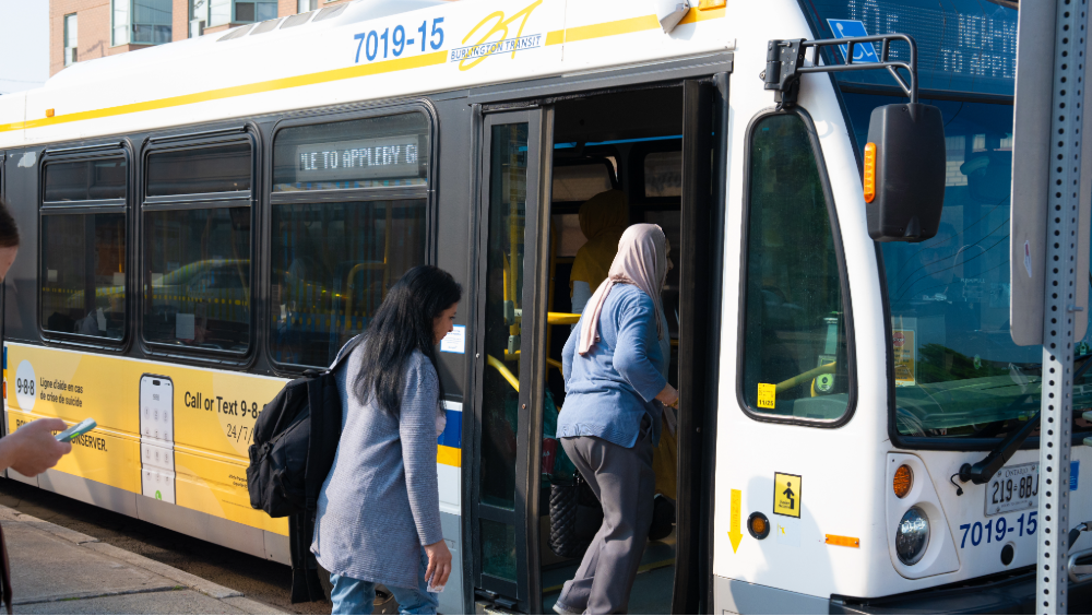 Burlington Transit city bus Two women getting on a Burlington Transit city bus