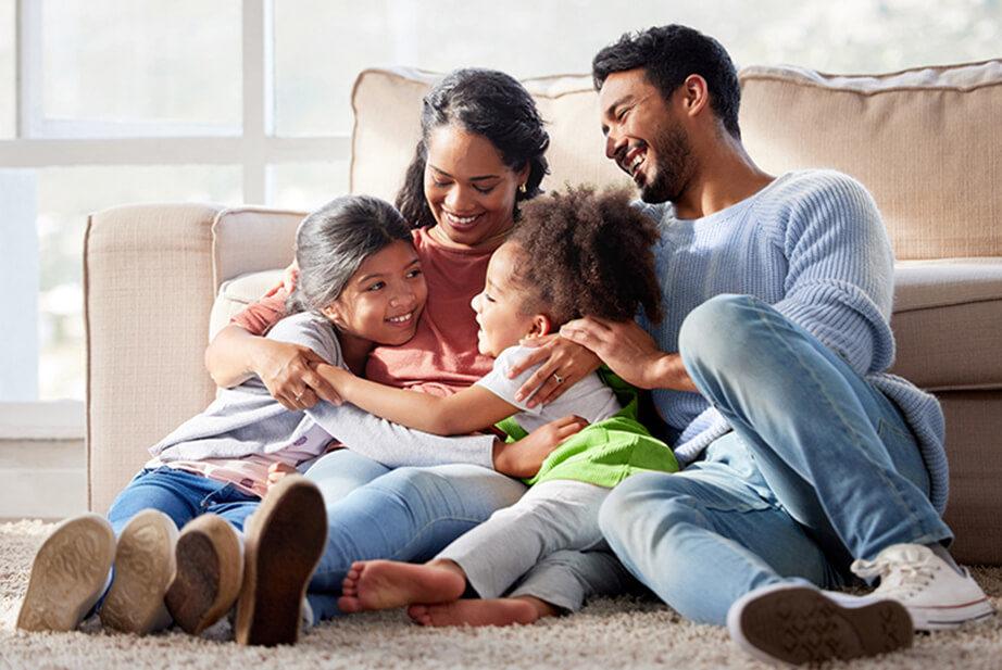 a family on the floor together