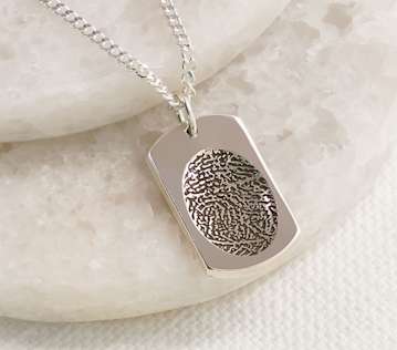 Fingerprint imprinted on necklace pendant