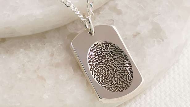 Fingerprint imprinted on necklace pendant