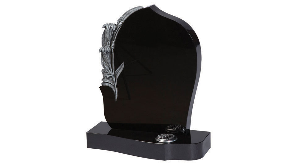 Carved floral spray memorial Carved floral spray memorial