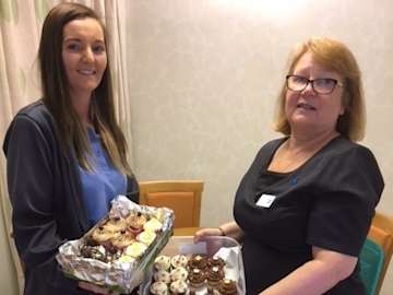 Funeral arrangers bringing in homemade cakes.