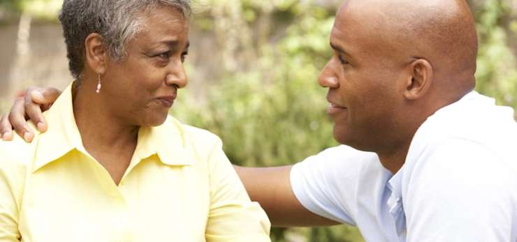 Couple talking to each other outside