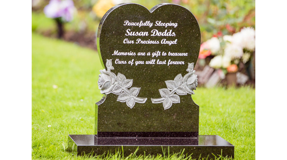 Heart shaped carved rose design memorial Heart shaped carved rose design memorial