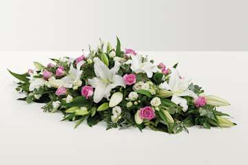 Pink and white rose and lily floral display