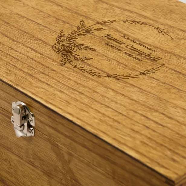 Close up of wooden box with engraved lid
