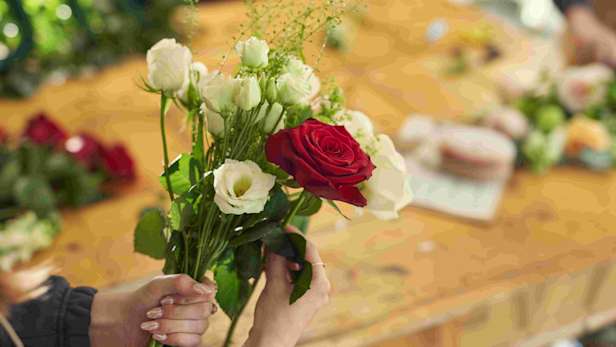 Florist holding flowers 3 RGB