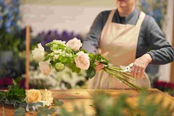 Florist holding flowers 1 RGB