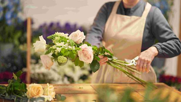 Florist holding flowers 1 RGB