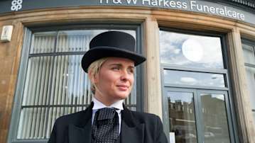 Funeral Director Raegan Drew, stood outside HW Harkess Funeralcare