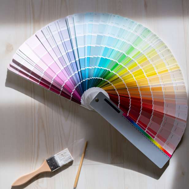 Open fan of dulux colour cards