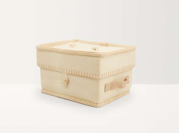 Cropped image of white wool casket