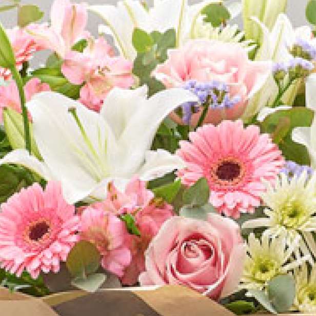 Bouquet with pink roses and white lilies