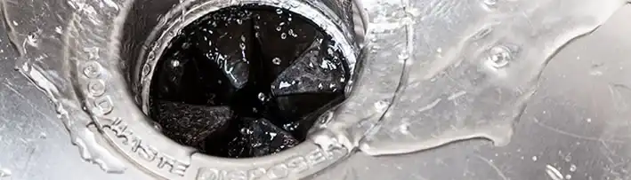 water running down a sink drain
